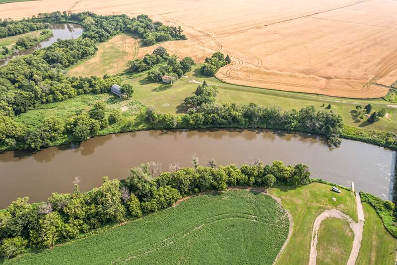 Purchase a development lot on the Red River.